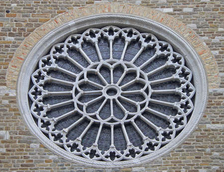 Rosette and window of church in Trieste, Italyの写真素材