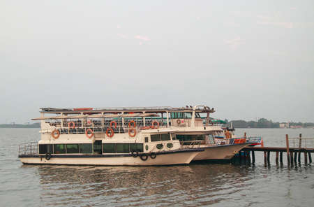 a few ferries in sea port of Kochi, Indiaの写真素材