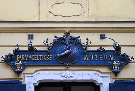sign at the entrance of The Pharmacy Museum in Bratislavaのeditorial素材