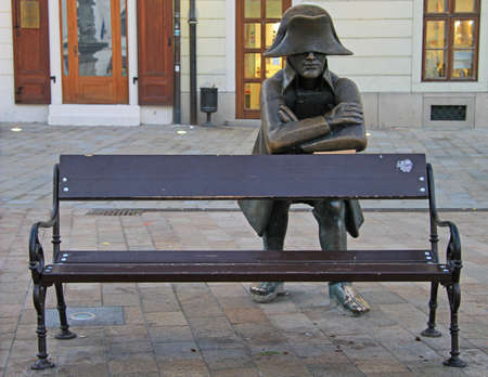 bench with bronze sculpture of Napoleon in Bratislava, Slovakiaのeditorial素材