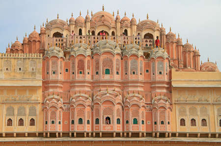 Jaipur, India - February 23, 2015: tourists are walking by palace Hawa Mahal in Jaipur, India. This photo was taken outdoorのeditorial素材