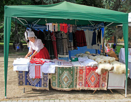 Eger, Hungary - July 2, 2017: tent with traditional clothes on folk festival in Eger, Hungaryのeditorial素材