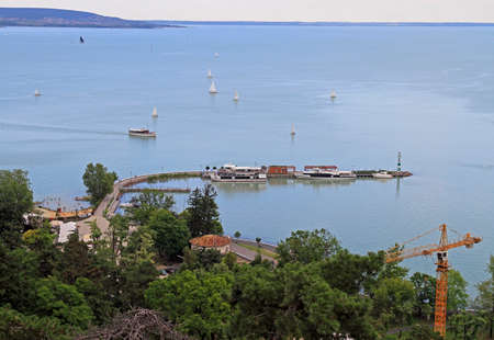 view of lake Balaton from the central square in Tihony, Hungaryの写真素材