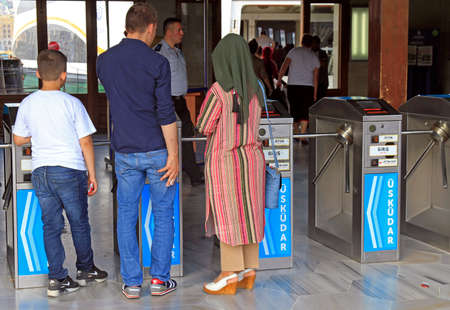 Istanbul, Turkey - August 11, 2017: people are passing through wicket to ferry in Istanbul, Turkeyのeditorial素材