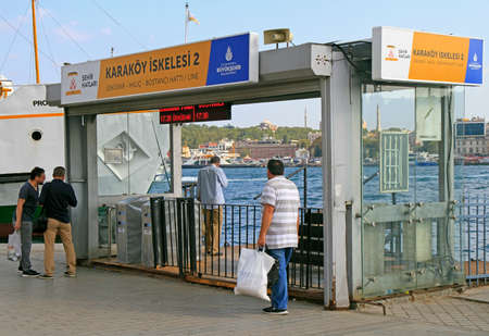 Istanbul, Turkey - August 11, 2017: people are passing through wicket to ferry in Istanbul, Turkeyのeditorial素材