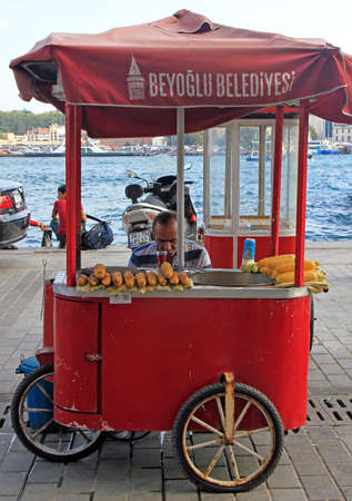 Istanbul, Turkey - August 11, 2017: man is selling fried corn outdoor in Istanbul, Turkeyのeditorial素材