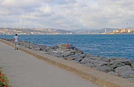 Istanbul, Turkey - August 10, 2017: people are walking by embankment of straint Bosphorus in Istanbul, Turkeyのeditorial素材