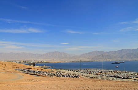 new cars lined up in the port of Eilat