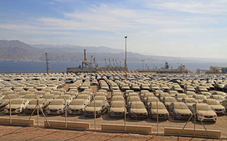 new cars lined up in the port of Eilat
