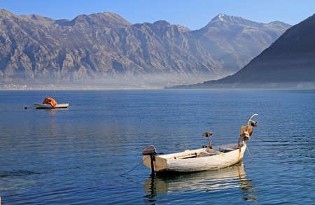 a few boats moored in bay of Kotor, Montenegroの写真素材