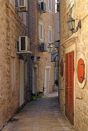 Picturesque narrow street in old town of Budva, Montenegroの写真素材