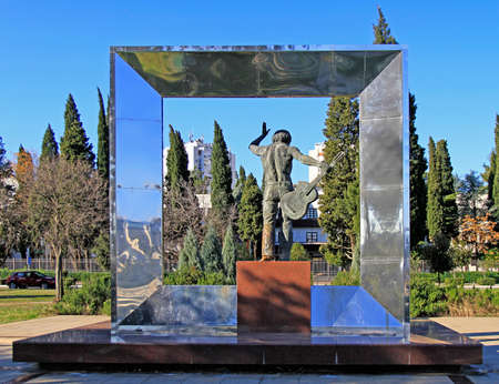 Podgorica, Montenegro - December 24, 2017: rear view of monument to famous Russian singer and poet Vladimir Semyonovich Vysotsky in Podgorica, Montenegro. Sculptor Alexander Taratynovのeditorial素材