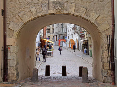 people are walking by street in old city of Rigaのeditorial素材