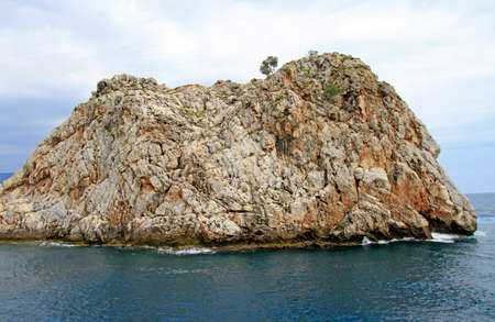 Seascape with Alanya's castle rock peninsula and mountains, Turkeyの写真素材