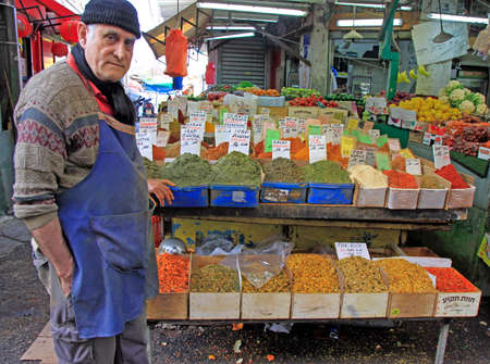 Tel Aviv, Israel - November 30, 2017: man sells seasonings at Carmel market in Tel-Aviv, Israelのeditorial素材