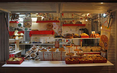 Toulouse, France - December 4, 2018: the stall with bread and snacks at outdoor christmas market in Toulouse, Franceのeditorial素材