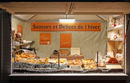 Toulouse, France - December 4, 2018: the stall with snacks at outdoor christmas market in Toulouse, Franceのeditorial素材