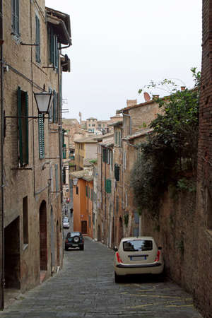 the narrow street in old town of Sienaの写真素材