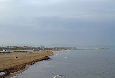 people are relaxing at city beach in Valenciaの写真素材