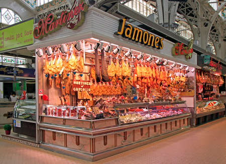 Valencia, Spain - April 26, 2018: stall with meat at central market in Valencia, Spainのeditorial素材