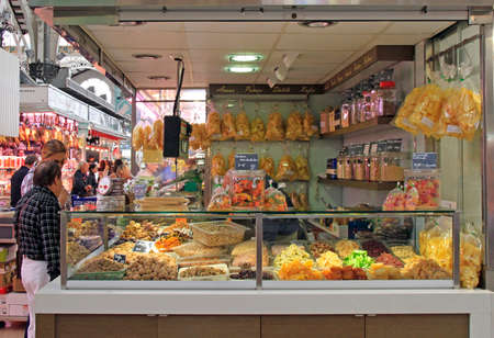 Valencia, Spain - April 26, 2018: stall with dried fruits and nuts at central market in Valenciaのeditorial素材
