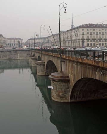 Turin, Italy - December 19, 2019: Vittorio Emanuele I bridge on the river Po in italian Turinの写真素材