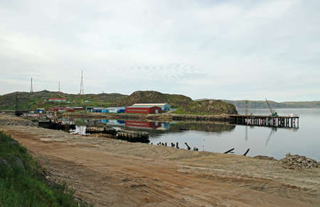 pier and water line in village Teriberka, Russiaの写真素材