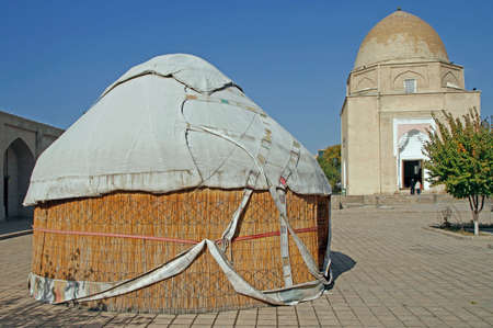 the traditional yurt and Ruhabad Mausoleum in the uzbek city Samarqandの写真素材