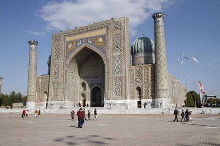 Samarkand, Uzbekistan - November 3, 2019: people are walking by Registan Square in the uzbek city Samarkandのeditorial素材