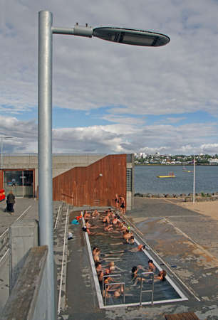 public pool with free access at beach in Reykjavikのeditorial素材