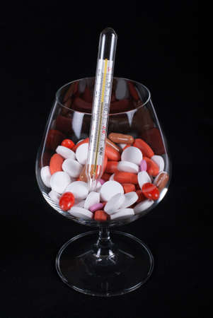 pills and thermometer