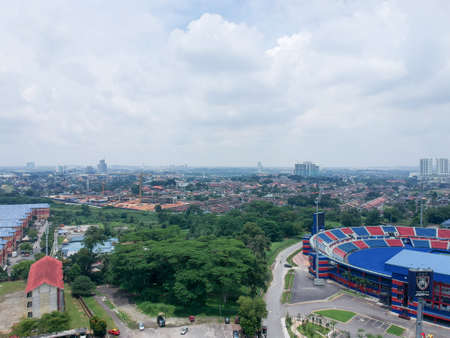Aerial Photo - Bird's eye view of the Tan Sri Dato' Haji Hassan Yunos Stadium, also simply known as Larkin Stadium, is a multi-purpose stadium in Larkin, Johor Bahru, Johor, Malaysiaのeditorial素材