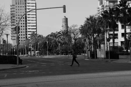 BARCELONA,SPAIN - February 26,2017: Shot of Plaça de Catalunya street  in Barcelona, Spain. This image may contain noise ,blurry clouds due to long exposure, soft focus and poor lighting.のeditorial素材