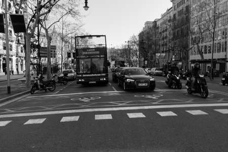 BARCELONA,SPAIN - February 26,2017: Shot of Plaça de Catalunya street  in Barcelona, Spain. This image may contain noise ,blurry clouds due to long exposure, soft focus and poor lighting.のeditorial素材