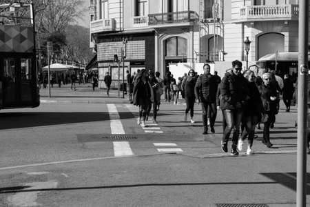 BARCELONA,SPAIN - February 26,2017: Shot of Plaça de Catalunya street  in Barcelona, Spain. This image may contain noise ,blurry clouds due to long exposure, soft focus and poor lighting.のeditorial素材