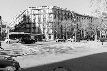 BARCELONA,SPAIN - February 26,2017: Shot of Plaça de Catalunya street  in Barcelona, Spain. This image may contain noise ,blurry clouds due to long exposure, soft focus and poor lighting.のeditorial素材