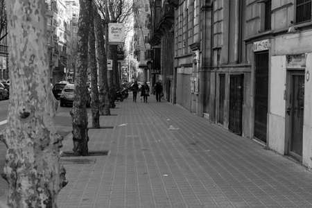 BARCELONA,SPAIN - February 26,2017: Shot of Plaça de Catalunya street  in Barcelona, Spain. This image may contain noise ,blurry clouds due to long exposure, soft focus and poor lighting.のeditorial素材