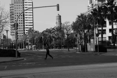 BARCELONA,SPAIN - February 26,2017: Shot of Plaça de Catalunya street  in Barcelona, Spain. This image may contain noise ,blurry clouds due to long exposure, soft focus and poor lighting.のeditorial素材
