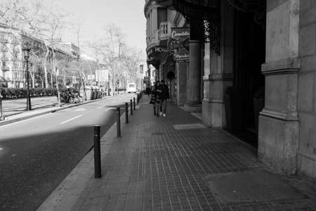 BARCELONA,SPAIN - February 26,2017: Shot of Plaça de Catalunya street  in Barcelona, Spain. This image may contain noise ,blurry clouds due to long exposure, soft focus and poor lighting.のeditorial素材