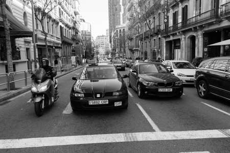 BARCELONA,SPAIN - February 26,2017: Shot of Plaça de Catalunya street  in Barcelona, Spain. This image may contain noise ,blurry clouds due to long exposure, soft focus and poor lighting.のeditorial素材