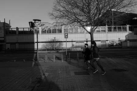 BARCELONA,SPAIN - February 26,2017: Shot of Plaça de Catalunya street  in Barcelona, Spain. This image may contain noise ,blurry clouds due to long exposure, soft focus and poor lighting.のeditorial素材