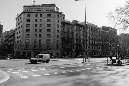 BARCELONA,SPAIN - February 26,2017: Shot of Plaça de Catalunya street  in Barcelona, Spain. This image may contain noise ,blurry clouds due to long exposure, soft focus and poor lighting.のeditorial素材