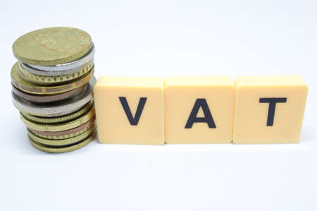 Finance Concept with Stack of Coins - VAT (Value Added Tax ) written on.の写真素材