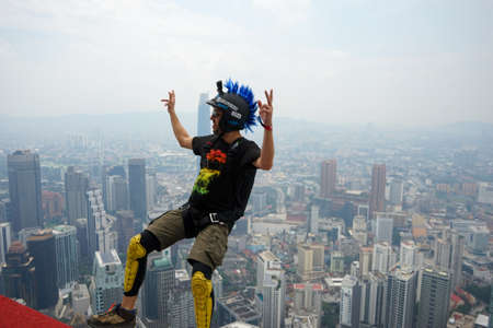 Kuala Lumpur, Malaysia â September 29, 2018: Base Jumpers jump from a 300m high deck during the Kuala Lumpur Tower International Jump.のeditorial素材