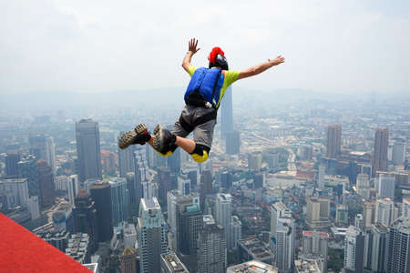 Kuala Lumpur, Malaysia â September 29, 2018: Base Jumpers jump from a 300m high deck during the Kuala Lumpur Tower International Jump.のeditorial素材