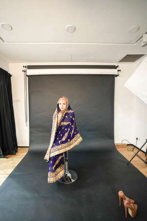 Kuala Lumpur, Malaysia â November 3, 2018: Group of photographers learning creative portrait during photo shooting in photography studio.のeditorial素材