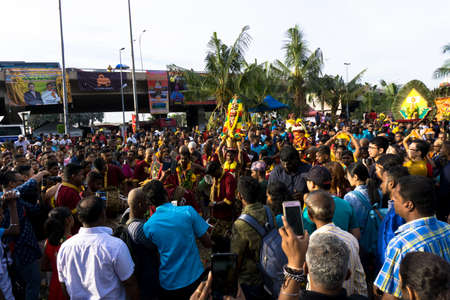 BATU CAVES, MALAYSIA - January 21, 2019: A celebration and devotee carrying kavadi preparing for ceremony prayers blessings during Thaipusam festival.のeditorial素材