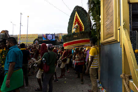 BATU CAVES, MALAYSIA - January 21, 2019: A celebration and devotee carrying kavadi preparing for ceremony prayers blessings during Thaipusam festival.のeditorial素材