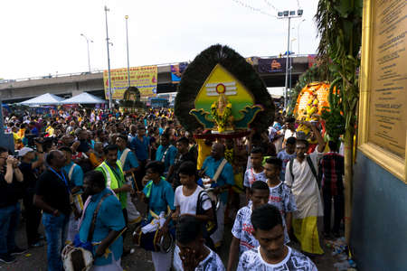 BATU CAVES, MALAYSIA - January 21, 2019: A celebration and devotee carrying kavadi preparing for ceremony prayers blessings during Thaipusam festival.のeditorial素材
