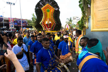 BATU CAVES, MALAYSIA - January 21, 2019: A celebration and devotee carrying kavadi preparing for ceremony prayers blessings during Thaipusam festival.のeditorial素材